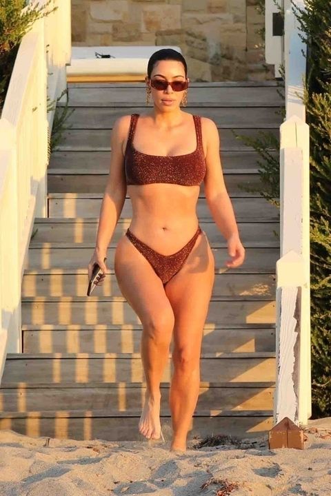 kim kardashian west sports a shimmering bikini at home