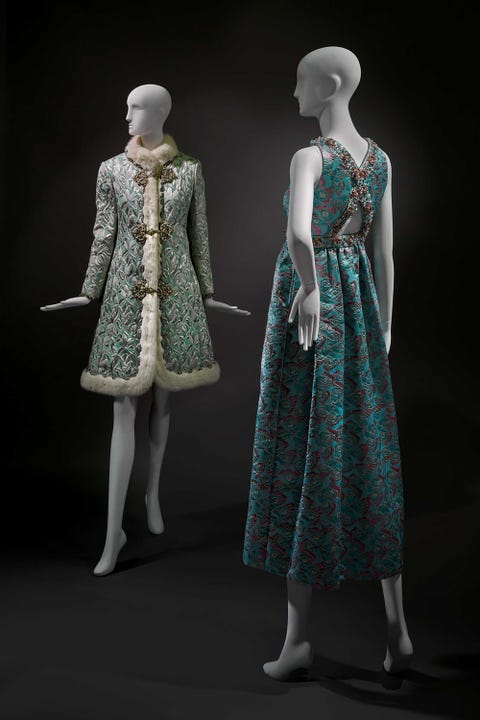 Clothing, Green, Fashion, Dress, Mannequin, Standing, Doll, Fashion design, Costume design, Outerwear, 