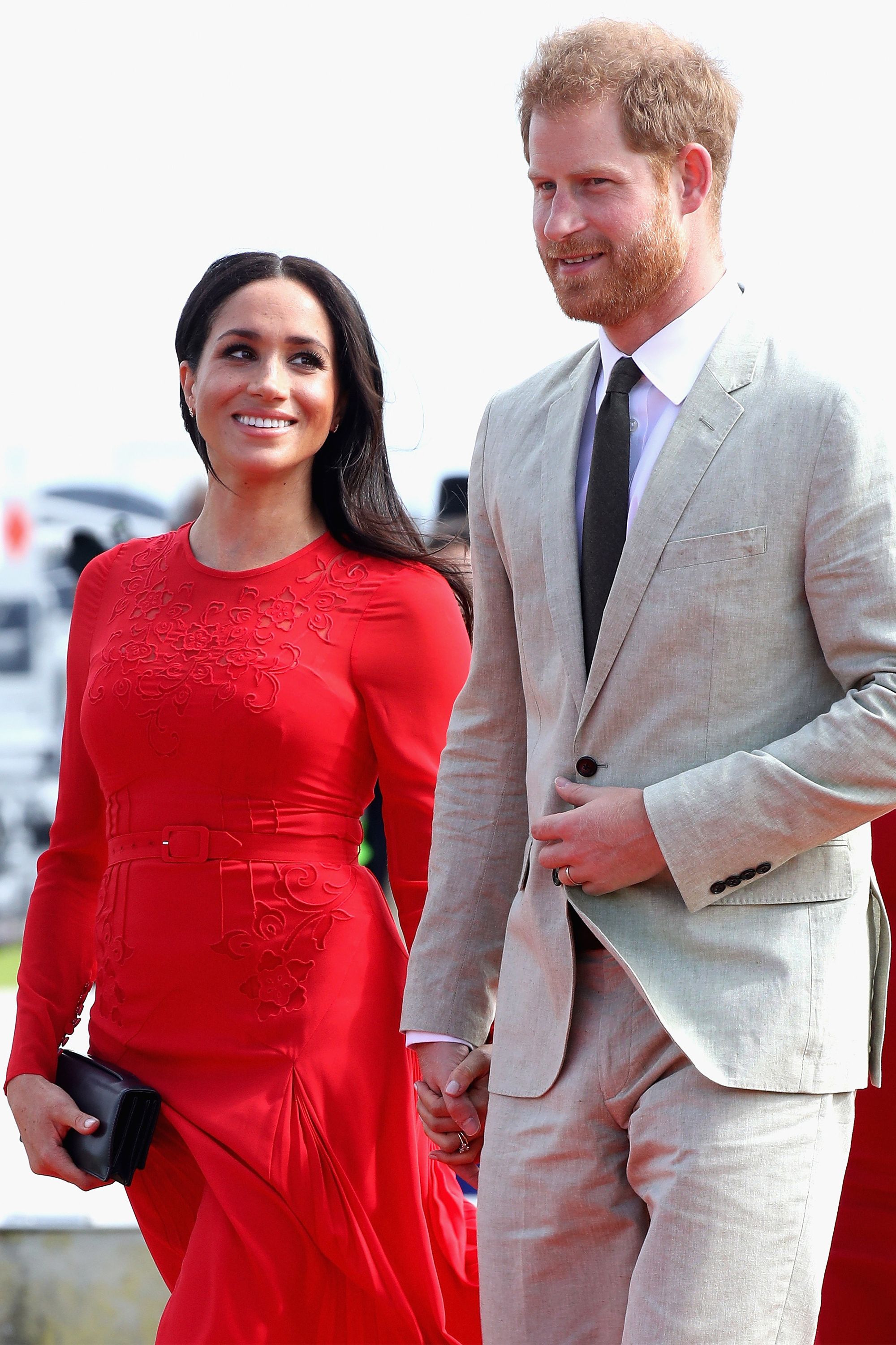 https://hips.hearstapps.com/hmg-prod.s3.amazonaws.com/images/hbz-prince-harry-meghan-markle-cute-moments-2018-10-gettyimages-1053237790.jpg?crop=1xw:1xh;center,top