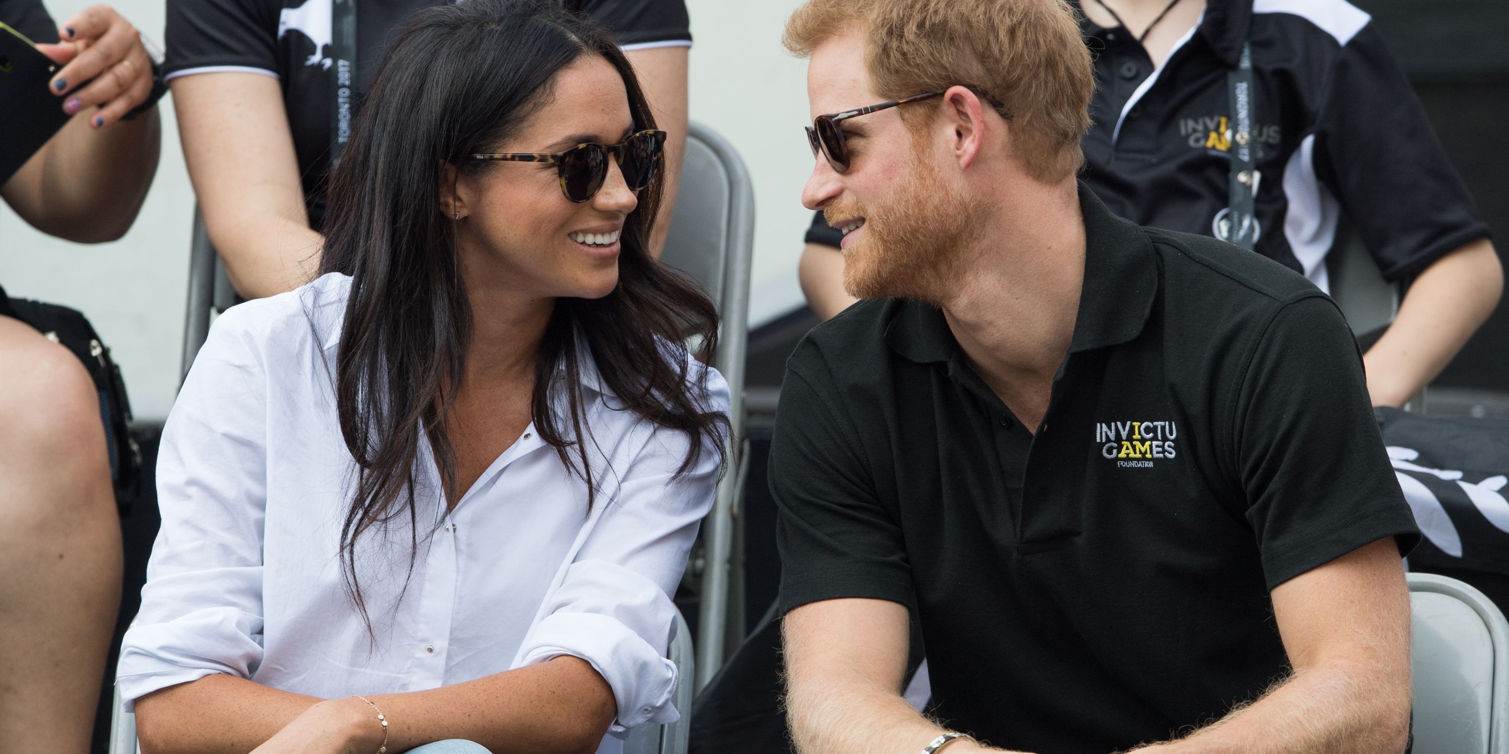 https://hips.hearstapps.com/hmg-prod.s3.amazonaws.com/images/hbz-prince-harry-meghan-markle-cute-moments-gettyimages-853710240-1523378904.jpg?crop=1xw:1xh;center,top