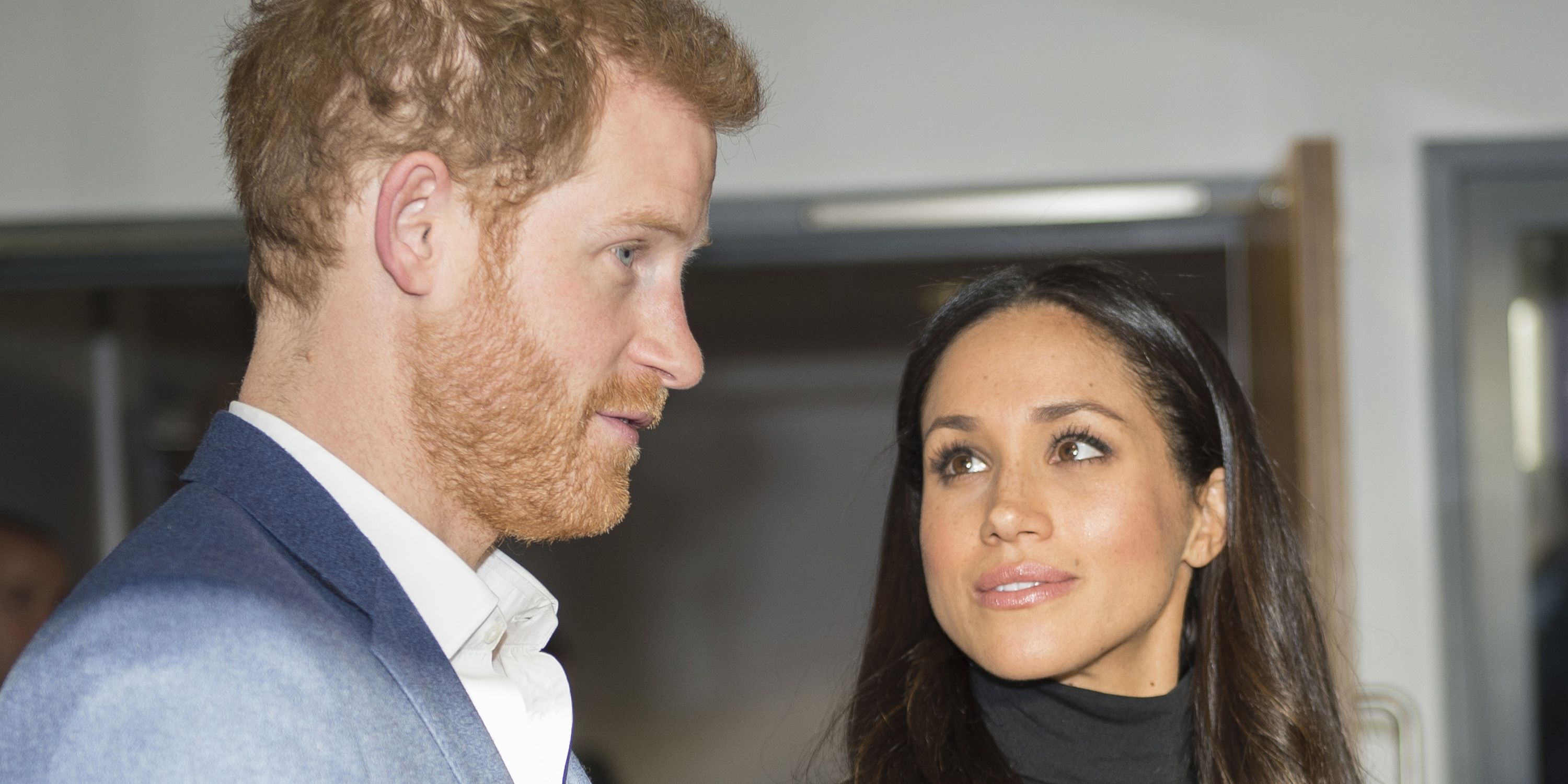 https://hips.hearstapps.com/hmg-prod.s3.amazonaws.com/images/hbz-prince-harry-meghan-markle-cute-moments-gettyimages-883619300-1523378904.jpg?crop=1xw:1xh;center,top