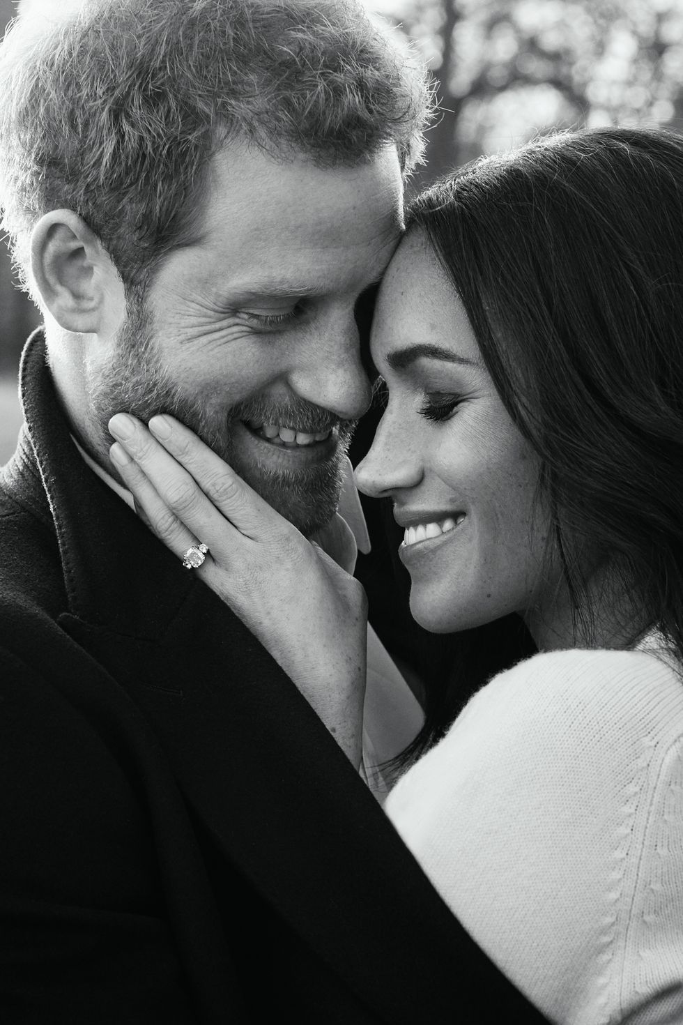 https://hips.hearstapps.com/hmg-prod.s3.amazonaws.com/images/hbz-prince-harry-meghan-markle-cute-moments-gettyimages-896535688-1523378905.jpg?crop=1xw:1xh;center,top