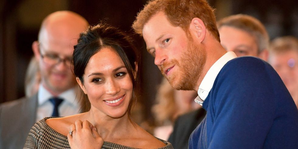 https://hips.hearstapps.com/hmg-prod.s3.amazonaws.com/images/hbz-prince-harry-meghan-markle-cute-moments-gettyimages-906665892-1523378906.jpg?crop=1xw:1xh;center,top