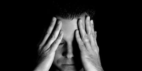 Man With Headache in Black and White