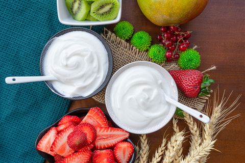 healthy breakfast with fresh greek yogurt on background