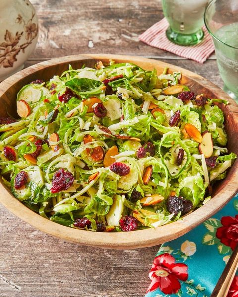 shaved brussels sprouts salad in wood bowl