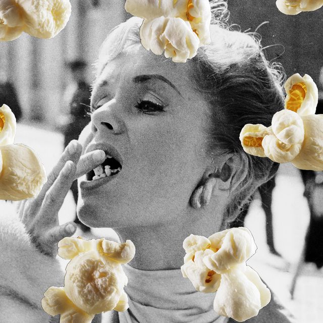 woman eating popcorn
