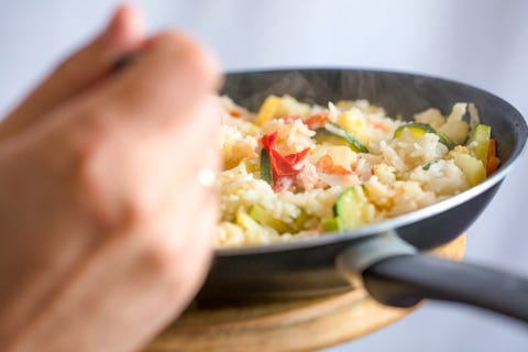 Healthy eating - rice with vegetables on frying pan Healthy eating - rice with vegetables on frying pan