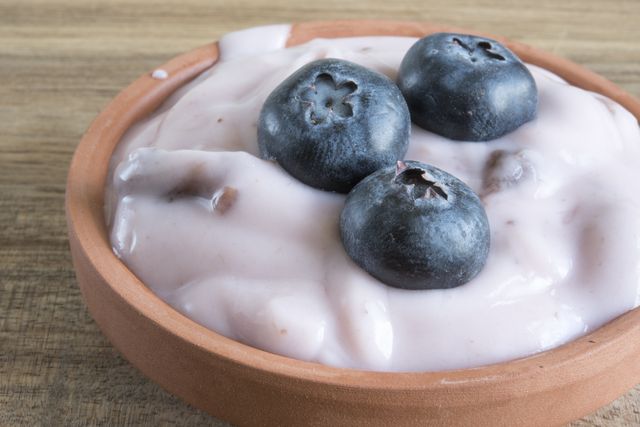 healthy eating yogurt portion with blueberries fruit on top
