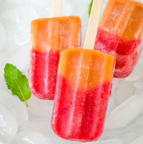 red and orange popsicles on ice
