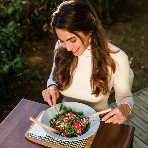 healthy woman eating the salad
