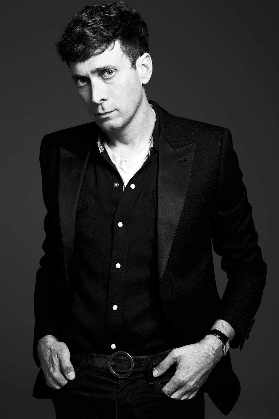 Hedi Slimane explains why he likes tampering with iconic fashion logos