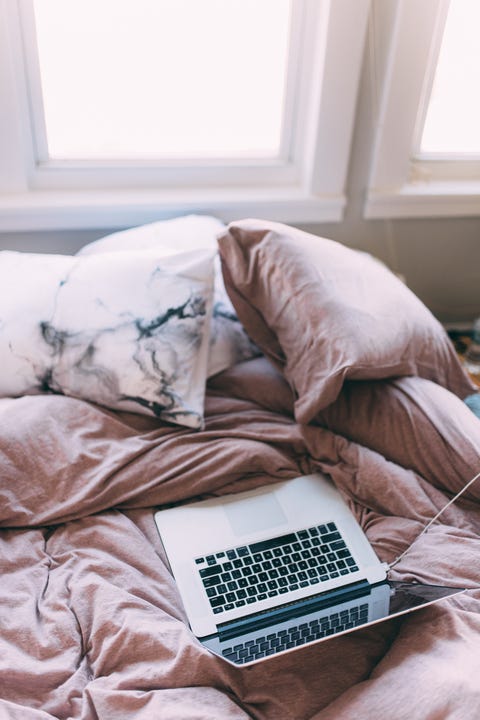 High Angle View Of Laptop On Bed At Home
