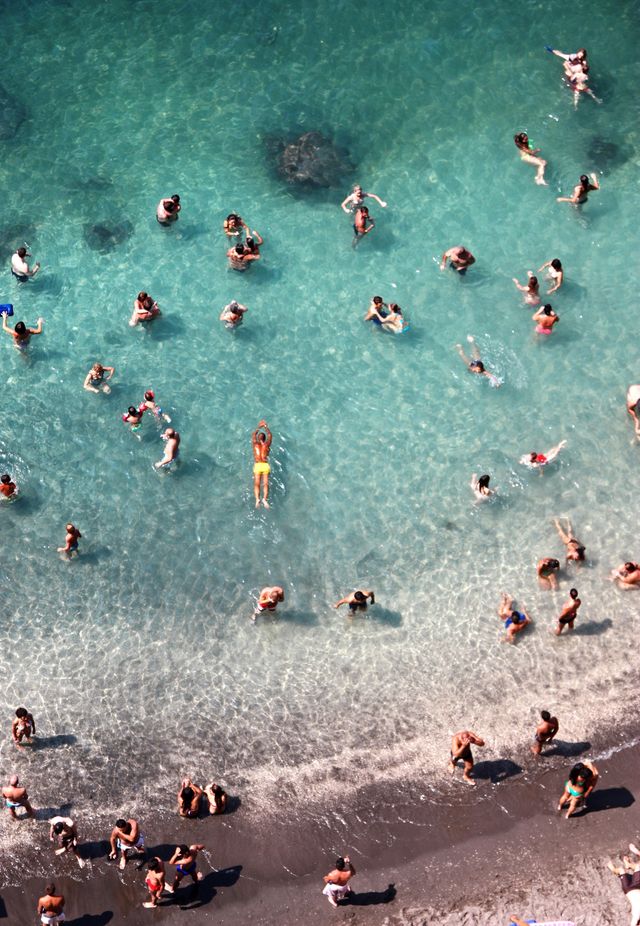 high angle view of people enjoying summer at sea