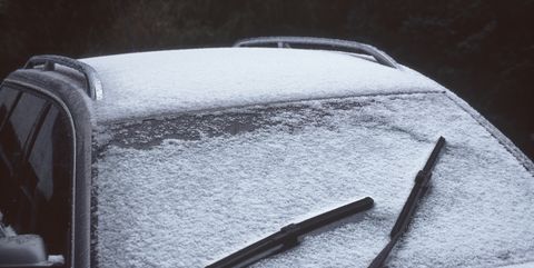 high angle view of snow covered car