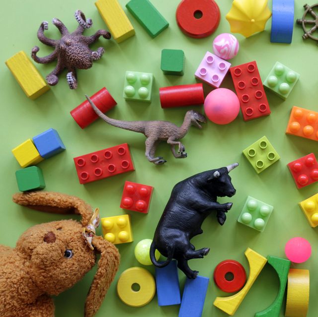 high angle view of toys over green background
