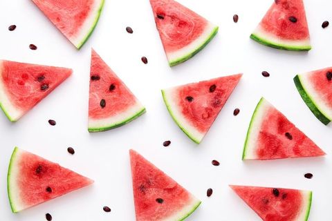 High Angle View Of Watermelon Slices Against White Background