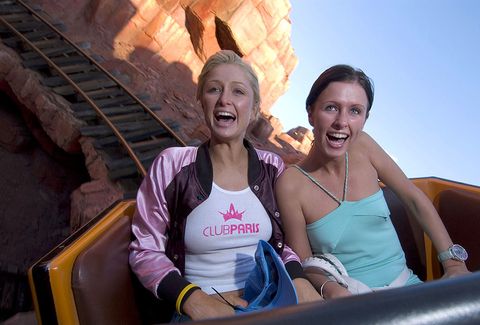 paris and nicky hilton take a ride aboard the big thunder mountain railroad roller coaster at walt disney world resort