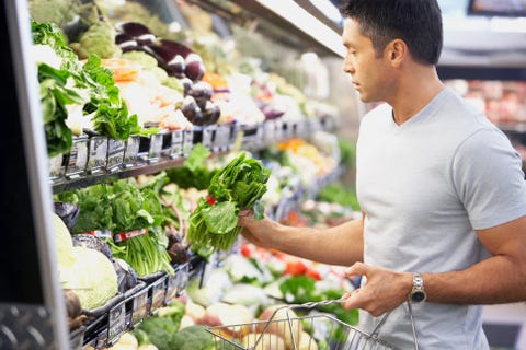 Hispanic man shopping for produce