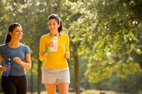 hispanic women walking in park