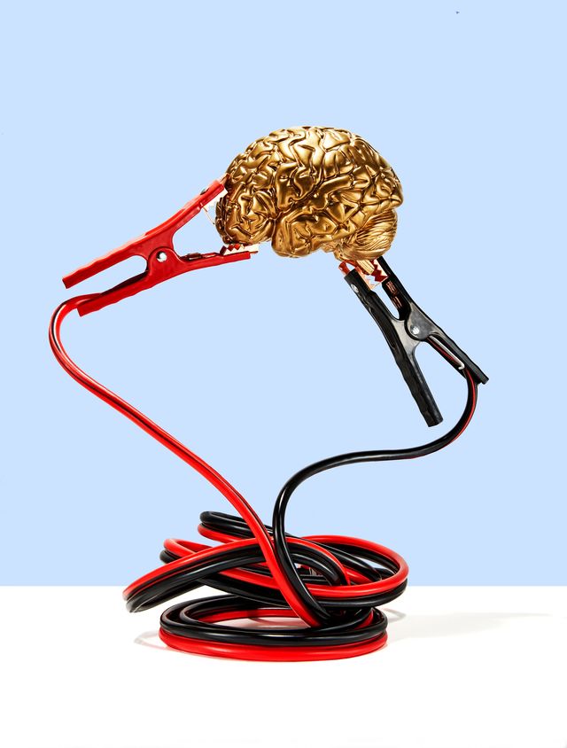 gold brain with jumper cables attached