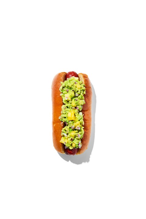 hotdog with toppings hawaiian guac guacamole, pineapple, red onion, cayenne