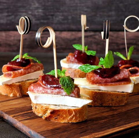 Holiday crostini skewers with cranberry sauce