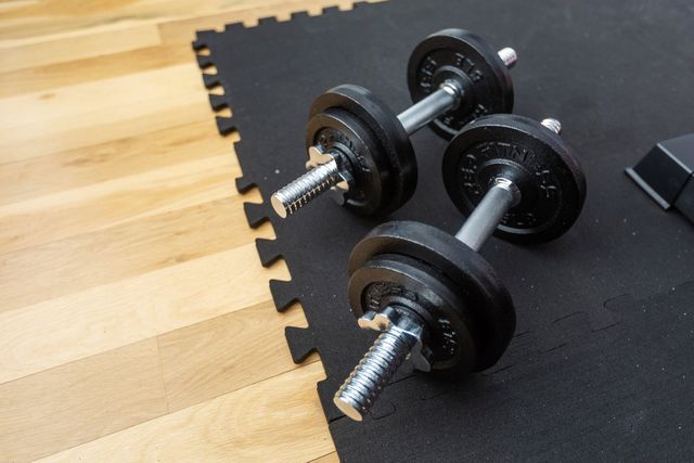 weights on a home gym floor