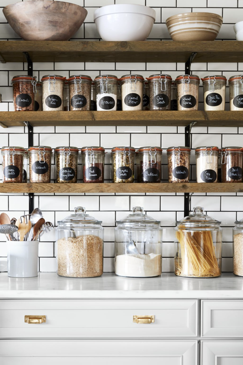 jars in kitchen on open shelves