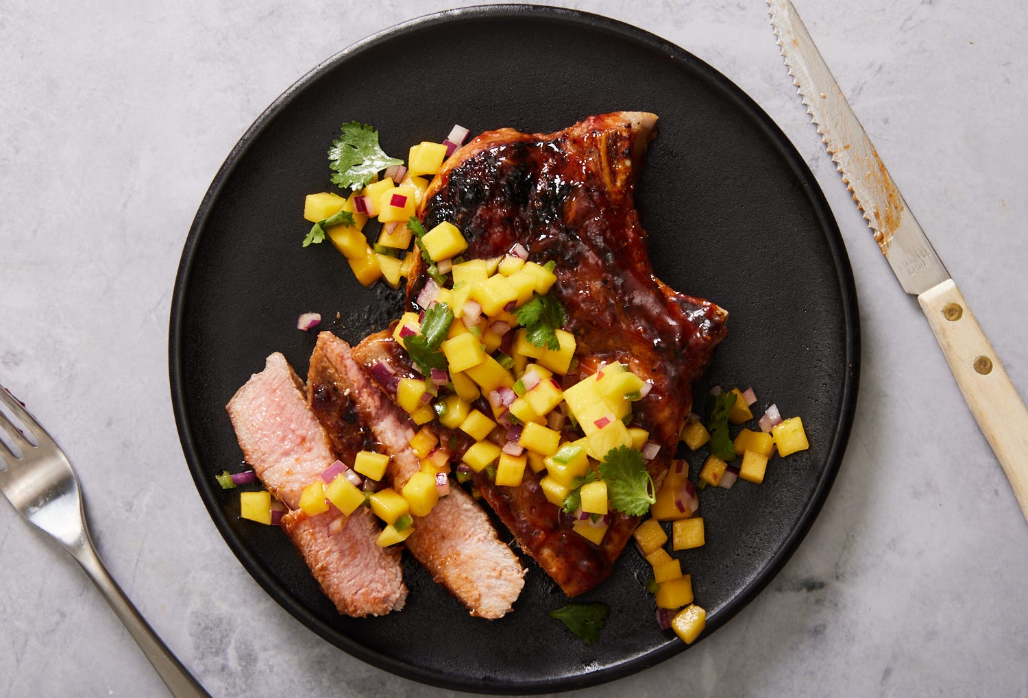 These Honey-Glazed Pork Chops With Mango Salsa Will Be Your New Go-To Main Dish