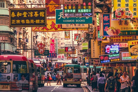 hong kong street scene, mongkok district with busses