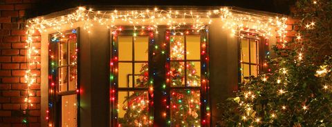 House window decorated with Christmas tree
