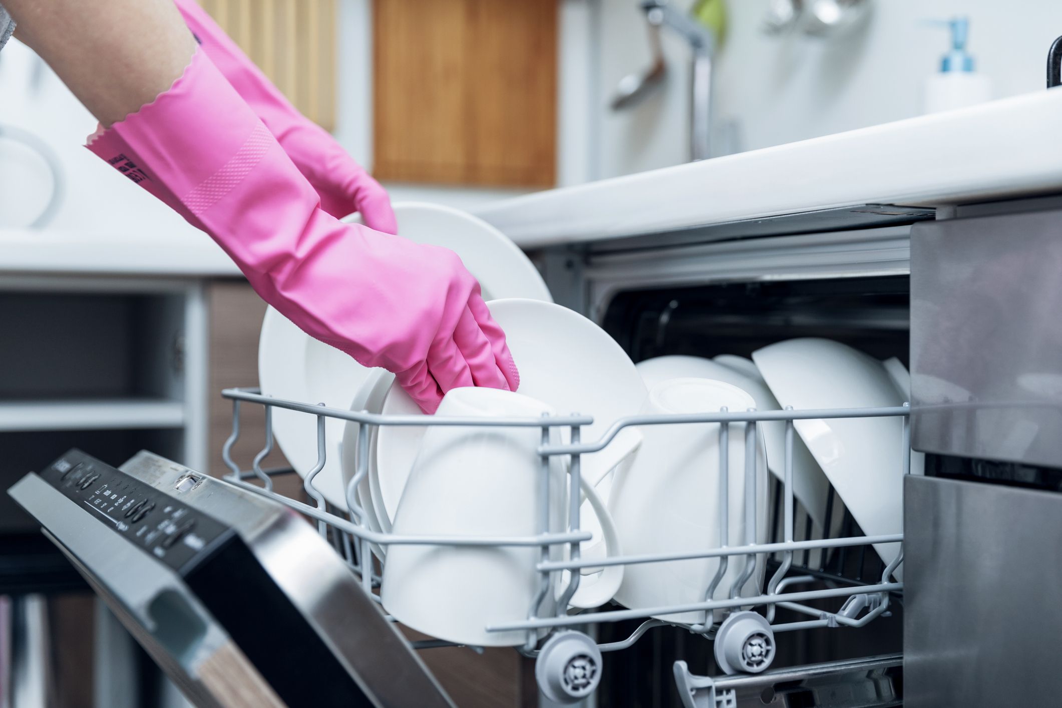 Easy Steps To Clean Your Dishwasher Best Way To Clean Inside The   Housewife Taking Out Clean Dishware From Dishwasher Royalty Free Image 903658124 1560287857 