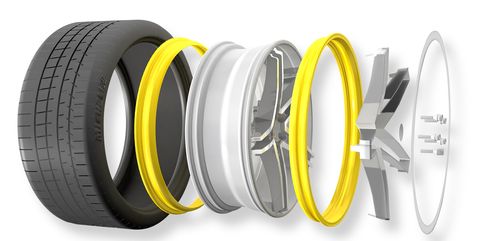 Tire, Automotive tire, Yellow, Synthetic rubber, Product, Wheel, Rim, Auto part, Automotive wheel system, Formula one tyres, 