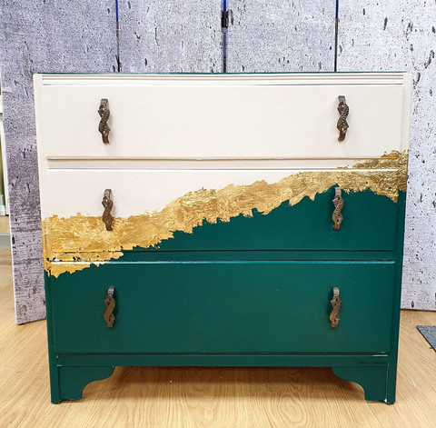 chalk paint on a cupboard in green and gold