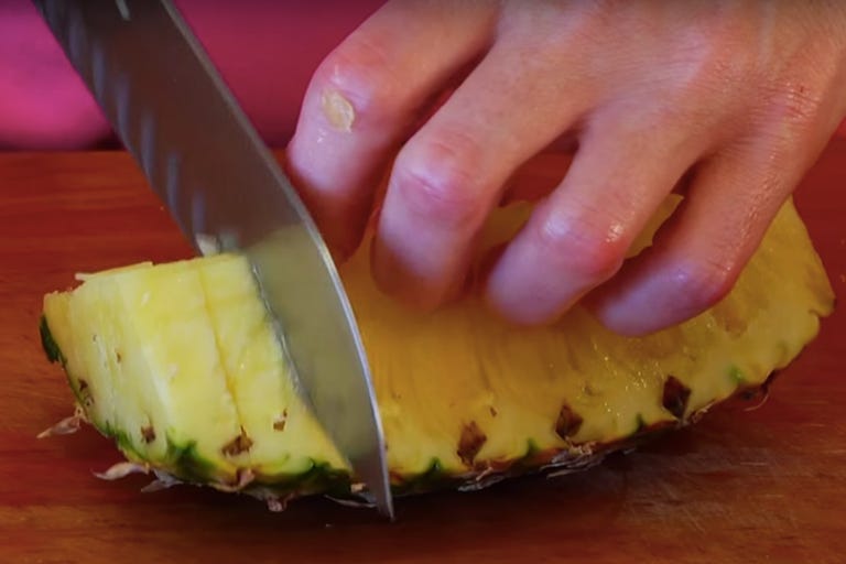 How to Cut a Pineapple Easily Cutting Up a Pineapple in 4 Steps