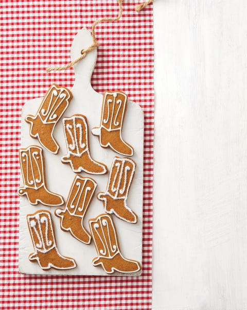 christmas cookie decorating with gingerbread cowboy boot cookies