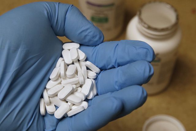 a pharmacy tech holds pills of hydroxychloroquine at rock canyon pharmacy in provo, utah, on may 20, 2020   us president donald trump announced may 18 he has been taking hydroxychloroquine for almost two weeks as a preventative measure against covid 19 photo by george frey  afp photo by george freyafp via getty images