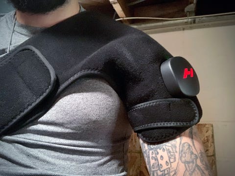 man wearing a hyperice venom shoulder brace