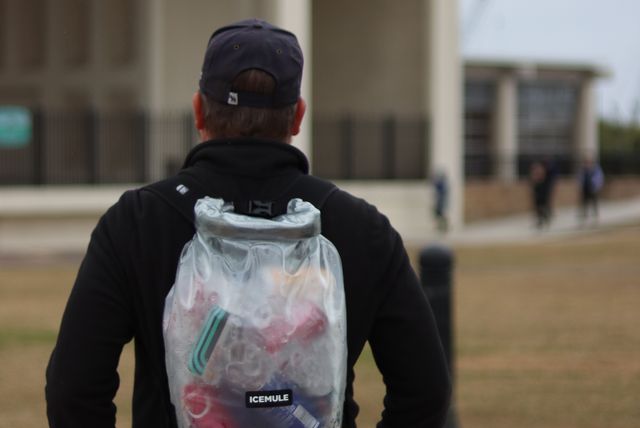 man wearing icemule jaunt cooler as a backpack