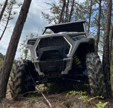 rzr trail squeezing between two trees