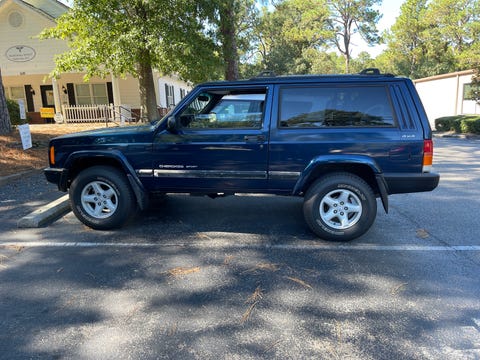 a blue xj jeep cherokee