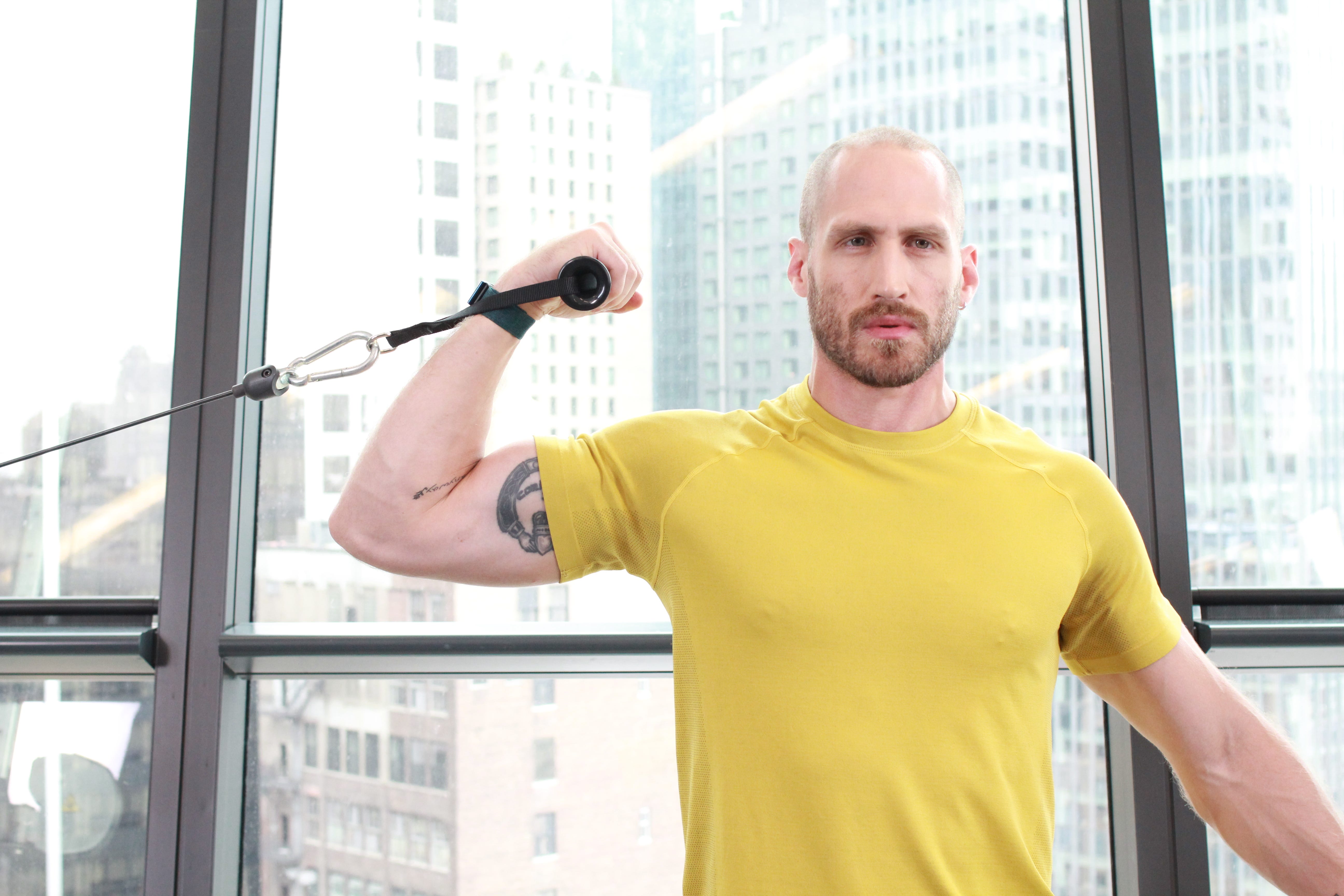 The Crucifix Curl Attacks Your Biceps in a Whole New Way