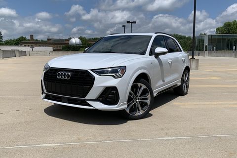 audi q3 parked in an empty science center parking lot