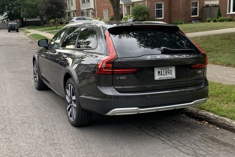 volvo v90 cross country parked on side of suburban street