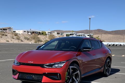 kia ev6 gt in a parking lot with nevada desert in background