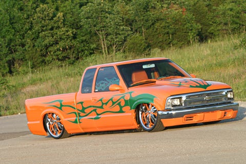 a bright orange mini truck