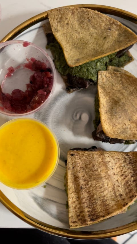 plate with sakara vegan quesadilla, plant-based cheese, and salsa on it plate with sakara vegan quesadilla plant based cheese and salsa on it
