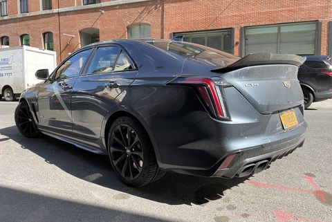 2022 cadillac ct4 v blackwing rear three quarter view in blue gray paint