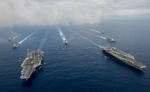 The aircraft carriers USS Reagan, USS Stennis and escorts in the Philippine Sea, 2016.